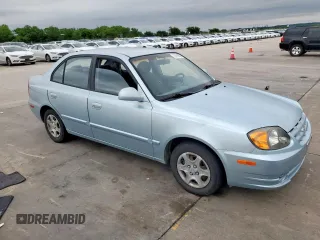 2003 Hyundai Accent GL z VIN KMHCG45C73U481294, wystawiony jako Copart lot #55958005 z przebiegiem 136 964 mil mil oraz Czysty tytuł • Clean title. Historia ofert i sprzedaży dostępna na DreamBid. Obrazek 4.