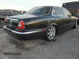 2004 Jaguar XJ with VIN SAJWA71C04SG31354, listed as a Copart auction lot 73742404 with 0 mi miles and Non Repairable. Bid and sale history available at carsss.com. Image 3.