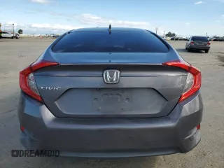 2018 Honda Civic EX с VIN 2HGFC2F71JH519669, выставлен на аукционе Copart как лот 47283725 с пробегом 130 590 миль миль и Списание • Salvage title. История ставок и продаж доступна на DreamBid. Изображение 6.
