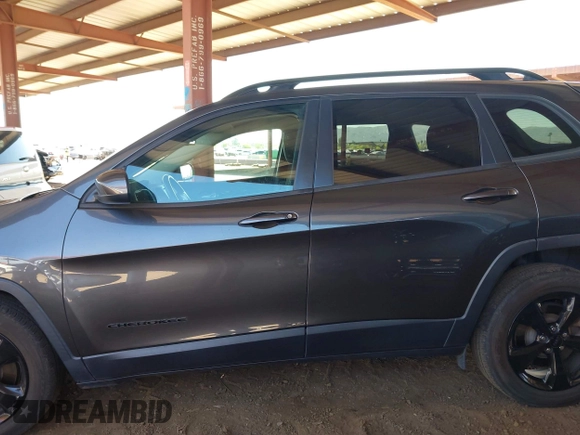 2016 Jeep Cherokee Latitude with VIN 1C4PJLCS4GW184621, listed as a IAAI auction lot 42007342 with 120,609 mi miles and . Bid and sale history available at DreamBid. Image 14.