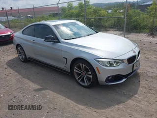 2014 BMW 4 Series 428i xDrive z VIN WBA3N5C50EF716708, wystawiony jako IAAI lot #42867738 z przebiegiem 103 412 mil mil oraz . Historia ofert i sprzedaży dostępna na DreamBid. Obrazek 1.