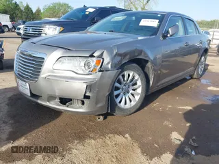 2014 Chrysler 300 with VIN 2C3CCAAG4EH159911, listed as a IAAI auction lot 41963042 with 105,972 mi miles and . Bid and sale history available at DreamBid. Image 17.