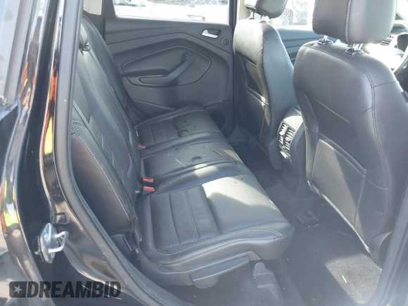2016 Ford Escape Titanium with VIN 1FMCU9J94GUA06028, listed as a IAAI auction lot 42102769 with 88,278 mi miles. Bid and sale history available at carsss.com. Image 8.