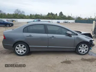 2011 Honda Civic LX with VIN 19XFA1F54BE032699, listed as a IAAI auction lot 42060272 with 197,905 mi miles and . Bid and sale history available at DreamBid. Image 14.