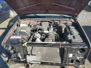 1997 GMC Yukon with VIN 1GKEK13R1VJ702558, listed as a Copart auction lot 85930054 with 165,837 mi miles and Salvage Title. Bid and sale history available at carsss.com. Image 12.