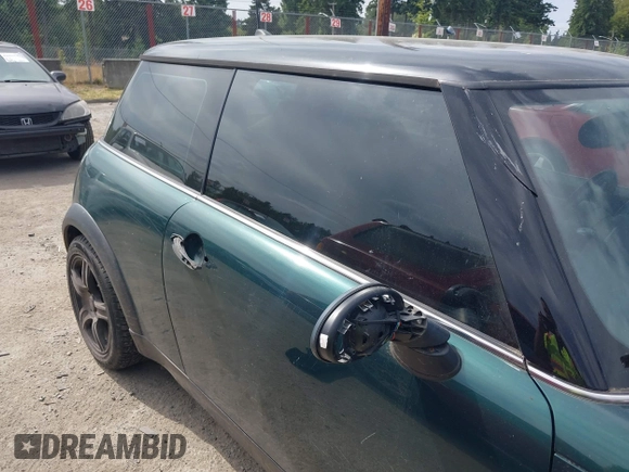 2005 MINI Hardtop with VIN WMWRC334X5TC59101, listed as a IAAI auction lot 42467671 with 180,264 mi miles and . Bid and sale history available at DreamBid. Image 6.