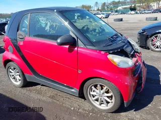 2009 Smart fortwo Pure with VIN WMEEJ31X29K305678, listed as a IAAI auction lot 41691476 with Not Provided miles and . Bid and sale history available at DreamBid. Image 1.