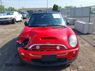 2006 MINI Convertible S with VIN WMWRH33596TK58563, listed as a IAAI auction lot 42210790 with 102,476 mi miles and . Bid and sale history available at DreamBid. Image 6.