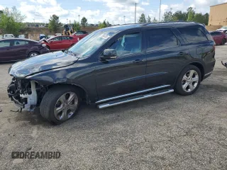 2014 Dodge Durango Limited z VIN 1C4RDHDG5EC313892, wystawiony jako Copart lot #52634355 z przebiegiem 167 053 mil mil oraz Szkoda całkowita • Salvage title. Historia ofert i sprzedaży dostępna na DreamBid. Obrazek 1.