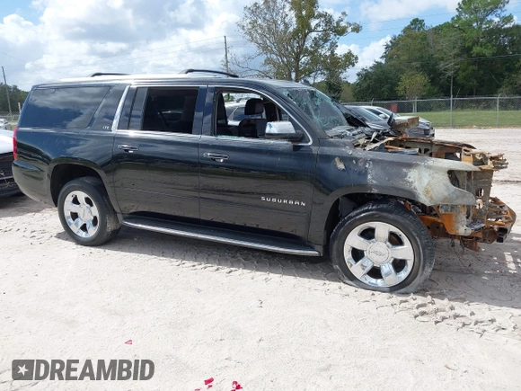 2015 Chevrolet Suburban LTZ with VIN 1GNSCKKC8FR156706, listed as a IAAI auction lot 40638221 with Not Provided miles and . Bid and sale history available at DreamBid. Image 1.