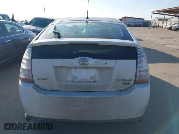 2008 Toyota Prius z VIN JTDKB20UX83457040, wystawiony jako IAAI lot #41626418 z przebiegiem 185 936 mil mil oraz . Historia ofert i sprzedaży dostępna na DreamBid. Obrazek 17.