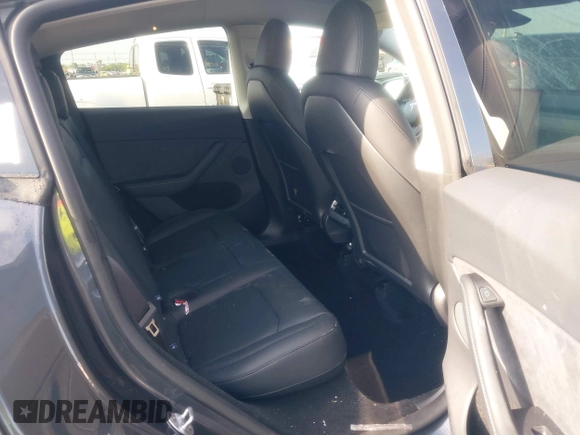 2024 Tesla Model Y with VIN 7SAYGDED3RA329355, listed as a IAAI auction lot 42343269 with 8,334 mi miles and . Bid and sale history available at DreamBid. Image 8.