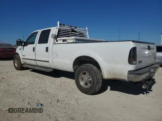 2000 Ford F-350 XL with VIN 3FTSW30F7YMA72223, listed as a Copart auction lot 81574774 with 203,727 mi miles and Salvage Title. Bid and sale history available at DreamBid. Image 2.