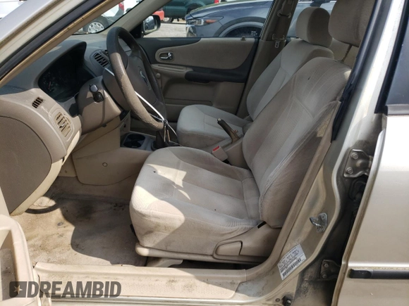 2003 Mazda Protege DX with VIN JM1BJ225X30107443, listed as a Copart auction lot 54777625 with 283,760 mi miles and Clean Title. Bid and sale history available at DreamBid. Image 7.