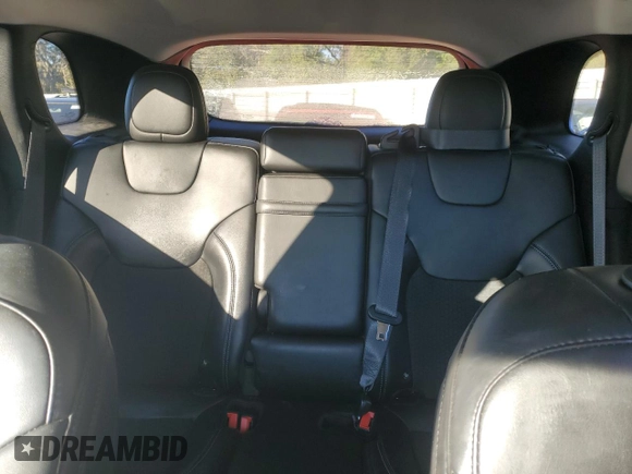 2019 Jeep Cherokee Latitude Plus with VIN 1C4PJLLX3KD130128, listed as a Copart auction lot 42393545 with 108,472 mi miles and Salvage Title. Bid and sale history available at DreamBid. Image 10.