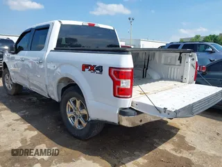 2018 Ford F-150 XL with VIN 1FTEW1EP9JKE58173, listed as a IAAI auction lot 42389998 with 129,512 mi miles and . Bid and sale history available at DreamBid. Image 3.