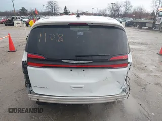 2023 Chrysler Pacifica Touring L with VIN 2C4RC1BG6PR520945, listed as a IAAI auction lot 41591128 with 70,351 mi miles and . Bid and sale history available at DreamBid. Image 17.
