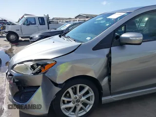 2013 Mazda 5 Touring with VIN JM1CW2CL7D0147063, listed as a IAAI auction lot 41771956 with 121,279 mi miles. Bid and sale history available at carsss.com. Image 17.