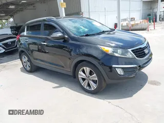 2014 Kia Sportage SX with VIN KNDPC3A66E7585269, listed as a IAAI auction lot 42423325 with 173,517 mi miles and . Bid and sale history available at DreamBid. Image 1.