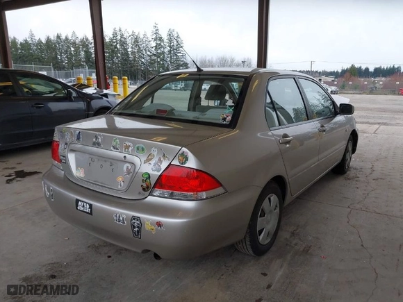 2005 Mitsubishi Lancer ES with VIN JA3AJ26E65U017027, listed as a IAAI auction lot 41765578 with 58,698 mi miles. Bid and sale history available at carsss.com. Image 4.