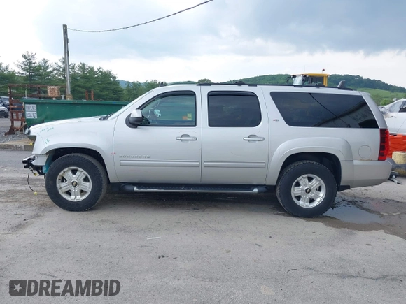 2011 Chevrolet Suburban LT with VIN 1GNSKJE32BR330742, listed as a IAAI auction lot 42435335 with 191,663 mi miles and . Bid and sale history available at DreamBid. Image 15.