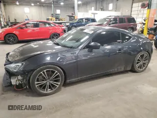 2014 Scion FR-S z VIN JF1ZNAA1XE9710165, wystawiony jako Copart lot #57465595 z przebiegiem 88 254 mil mil oraz Szkoda całkowita • Salvage title. Historia ofert i sprzedaży dostępna na DreamBid. Obrazek 1.