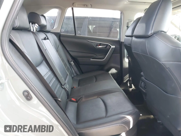 2023 Toyota RAV4 Hybrid XLE Premium with VIN JTMB6RFV8PD086983, listed as a IAAI auction lot 41612674 with 70,817 mi miles. Bid and sale history available at carsss.com. Image 8.