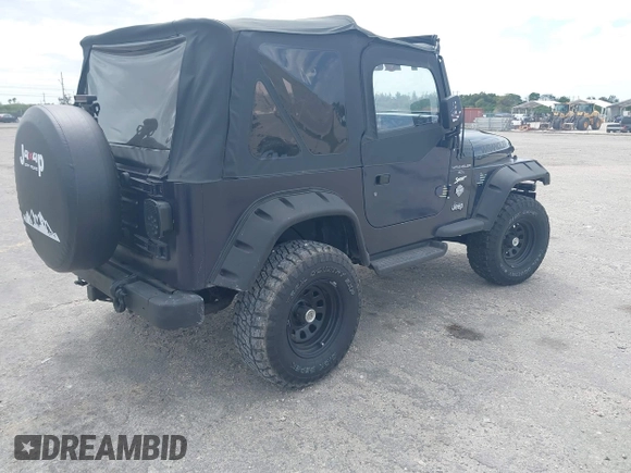 1997 Jeep Wrangler Sport with VIN 1J4FY19S2VP481780, listed as a IAAI auction lot 41822213 with 156,629 mi miles. Bid and sale history available at carsss.com. Image 4.