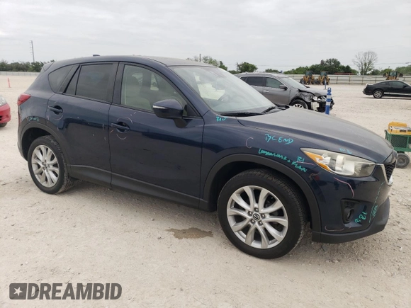 2015 Mazda CX-5 Grand Touring with VIN JM3KE4DY1F0480406, listed as a Copart auction lot 52349945 with 166,515 mi miles and Salvage Title. Bid and sale history available at carsss.com. Image 4.
