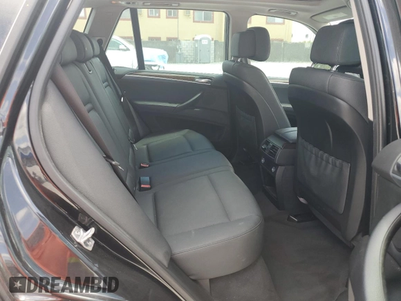 2013 BMW X5 xDrive35i z VIN 5UXZV4C58D0B21356, wystawiony jako Copart lot #54872375 z przebiegiem 113 825 mil mil oraz Szkoda całkowita • Salvage title. Historia ofert i sprzedaży dostępna na DreamBid. Obrazek 11.