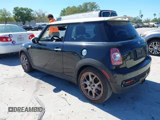2011 MINI Hardtop S with VIN WMWSV3C5XBTY22399, listed as a IAAI auction lot 41868705 with 134,516 mi miles and . Bid and sale history available at DreamBid. Image 3.