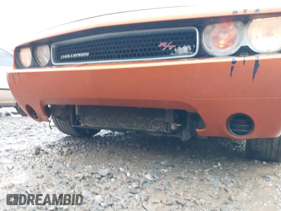 2011 Dodge Challenger z VIN 2B3CJ4DG5BH605530, wystawiony jako IAAI lot #41437632 z przebiegiem 139 992 mil mil oraz . Historia ofert i sprzedaży dostępna na DreamBid. Obrazek 6.