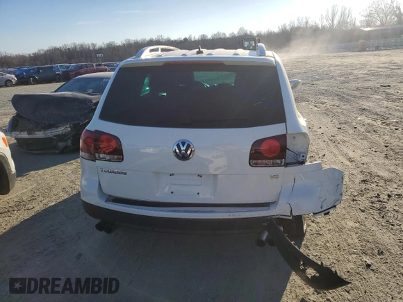 2009 Volkswagen Touareg VR6 z VIN WVGBE77L79D017480, wystawiony jako Copart lot #89344415 z przebiegiem 54 232 mil mil oraz Szkoda całkowita • Salvage title. Historia ofert i sprzedaży dostępna na DreamBid. Obrazek 6.