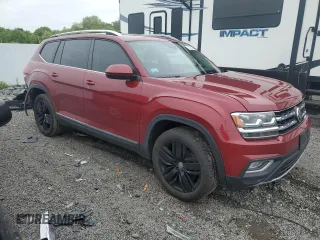 2018 Volkswagen Atlas SEL z VIN 1V2MR2CA4JC566698, wystawiony jako Copart lot #57026055 z przebiegiem 139 100 mil mil oraz Szkoda całkowita • Salvage title. Historia ofert i sprzedaży dostępna na DreamBid. Obrazek 4.