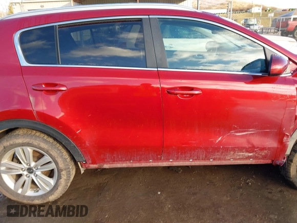 2018 Kia Sportage LX z VIN KNDPMCAC8J7360591, wystawiony jako IAAI lot #38685134 z przebiegiem 95 649 mil mil oraz . Historia ofert i sprzedaży dostępna na DreamBid. Obrazek 13.