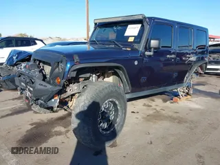 2008 Jeep Wrangler Unlimited Rubicon with VIN 1J8GA69158L616452, listed as a IAAI auction lot 41391875 with 91,143 mi miles and . Bid and sale history available at DreamBid. Image 18.