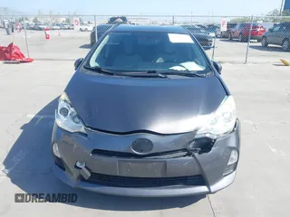 2014 Toyota Prius One with VIN JTDKDTB33E1061088, listed as a IAAI auction lot 42040762 with 206,735 mi miles and . Bid and sale history available at DreamBid. Image 6.
