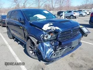 2016 Dodge Durango R/T with VIN 1C4SDJCT3GC416609, listed as a IAAI auction lot 41888750 with 78,007 mi miles and . Bid and sale history available at DreamBid. Image 1.