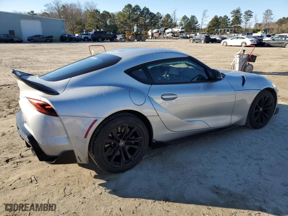 2022 Toyota GR Supra 2.0 with VIN WZ1DB2C08NW050265, listed as a Copart auction lot 88882465 with 14,576 mi miles and Salvage Title. Bid and sale history available at carsss.com. Image 3.