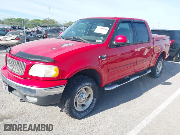 2003 Ford F-150 XLT with VIN 1FTRW08L43KD14456, listed as a IAAI auction lot 42098830 with 234,908 mi miles. Bid and sale history available at carsss.com. Image 2.