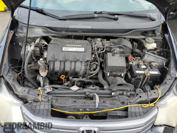 2010 Honda Insight LX with VIN JHMZE2H50AS009869, listed as a Copart auction lot 53031515 with 194,860 mi miles and Salvage Title. Bid and sale history available at DreamBid. Image 12.