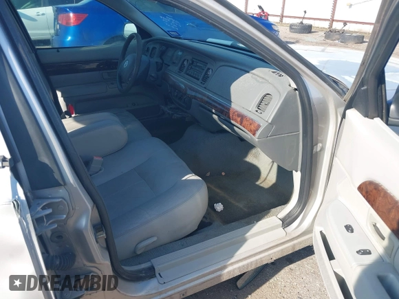 2004 Mercury Grand Marquis GS with VIN 2MEFM74W34X677247, listed as a IAAI auction lot 41856970 with 135,225 mi miles and . Bid and sale history available at DreamBid. Image 5.
