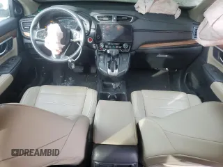 2017 Honda CR-V Touring with VIN 2HKRW2H91HH608340, listed as a Copart auction lot 43997625 with 58,446 mi miles and Salvage Title. Bid and sale history available at DreamBid. Image 8.