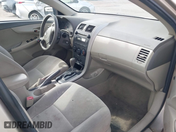 2009 Toyota Corolla with VIN 1NXBU40E09Z078912, listed as a IAAI auction lot 42381759 with 202,353 mi miles and . Bid and sale history available at DreamBid. Image 5.