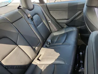 2023 Tesla Model 3 с VIN 5YJ3E1EAXPF594565, выставлен на аукционе Copart как лот 65361925 с пробегом Не указан миль и Списание • Salvage title. История ставок и продаж доступна на DreamBid. Изображение 10.