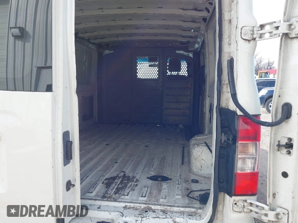 2013 Nissan NV S with VIN 1N6BF0KM9DN101101, listed as a IAAI auction lot 41384511 with 232,485 mi miles. Bid and sale history available at carsss.com. Image 8.