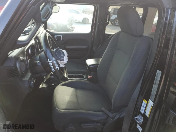 2019 Jeep Wrangler Unlimited Sport S with VIN 1C4HJXDG9KW555447, listed as a Copart auction lot 83659034 with 77,389 mi miles and Salvage Title. Bid and sale history available at carsss.com. Image 7.