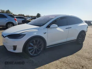 2017 Tesla Model X 90D with VIN 5YJXCBE21HF044498, listed as a Copart auction lot 49305475 with 86,064 mi miles and Salvage Title. Bid and sale history available at DreamBid. Image 1.