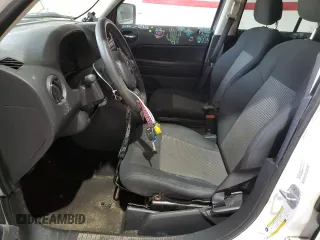 2011 Jeep Patriot Sport with VIN 1J4NT1GA4BD263521, listed as a Copart auction lot 54666735 with 176,606 mi miles and Salvage title. Bid and sale history available at DreamBid. Image 7.