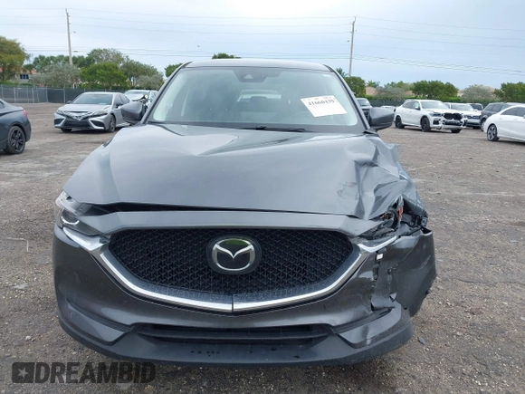 2021 Mazda CX-5 Touring with VIN JM3KFACM1M0461510, listed as a IAAI auction lot 41660439 with 30,352 mi miles. Bid and sale history available at carsss.com. Image 12.